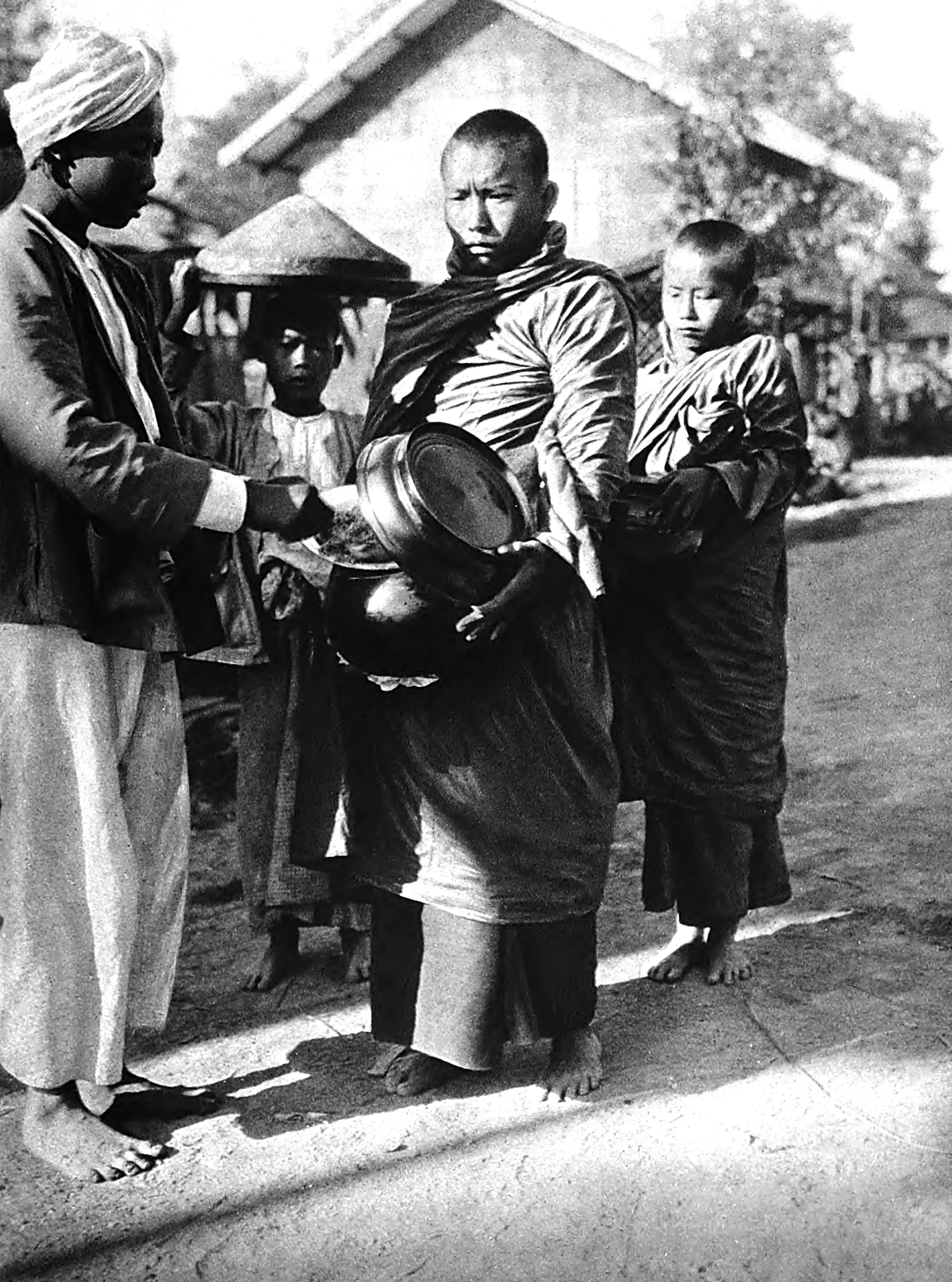 Monk collecting alms