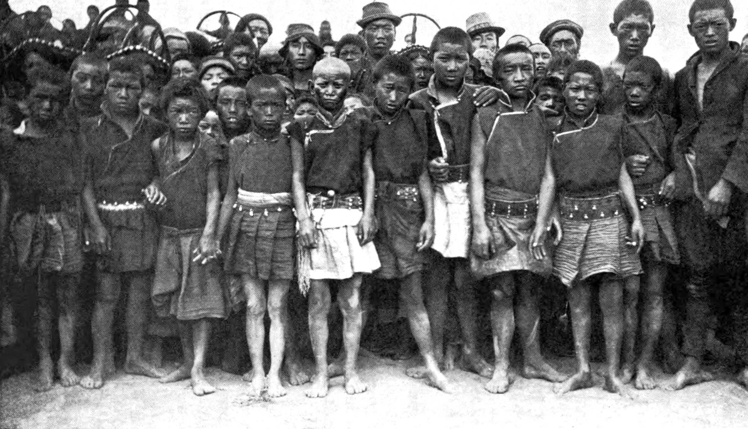 Boy monks dressed for playing