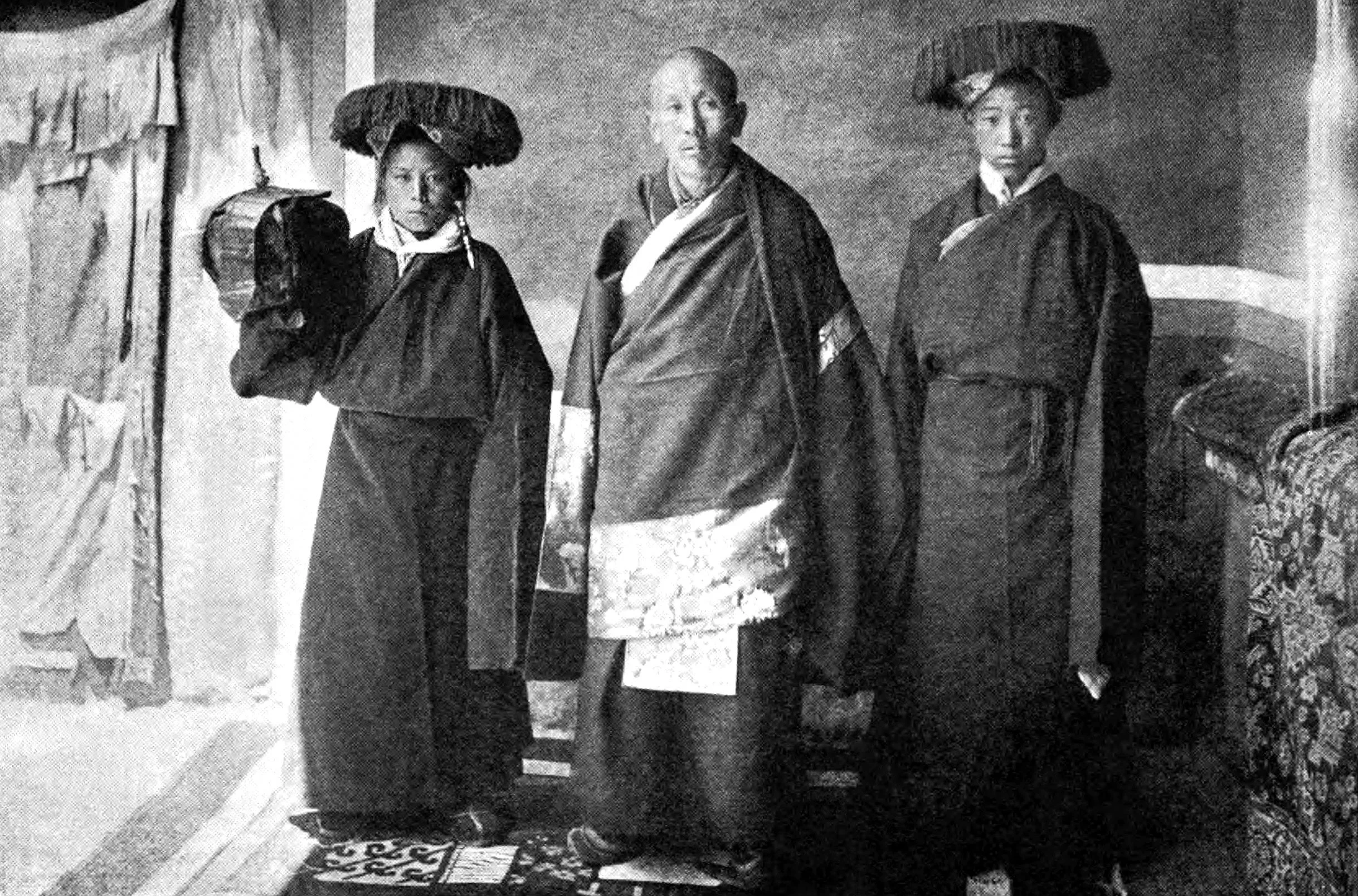 The Peak Secretary in his ecclesiastical robes with two attendants