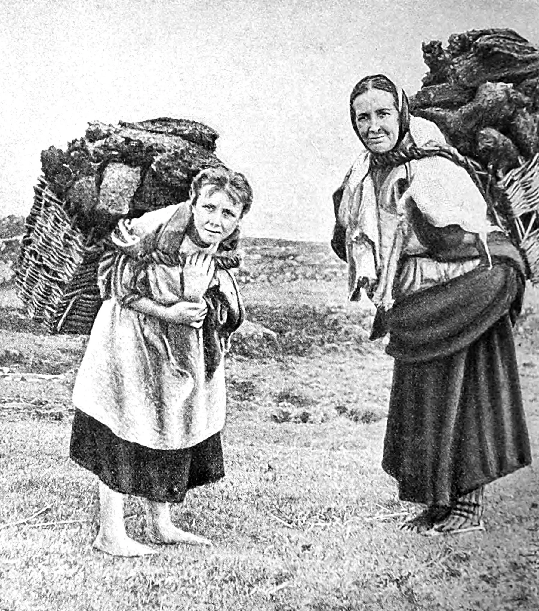 Irish Peasant Women hauling Peat