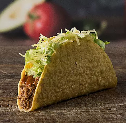CRUNCHY TACO  Introduced into the world in 1962 by Taco Bell’s founder, Glen Bell, our crunchy taco shells are fried fresh in our kitchens daily. This staple menu item is filled with Taco Bell’s famous seasoned beef, shredded iceberg lettuce and topped with cheddar cheese.