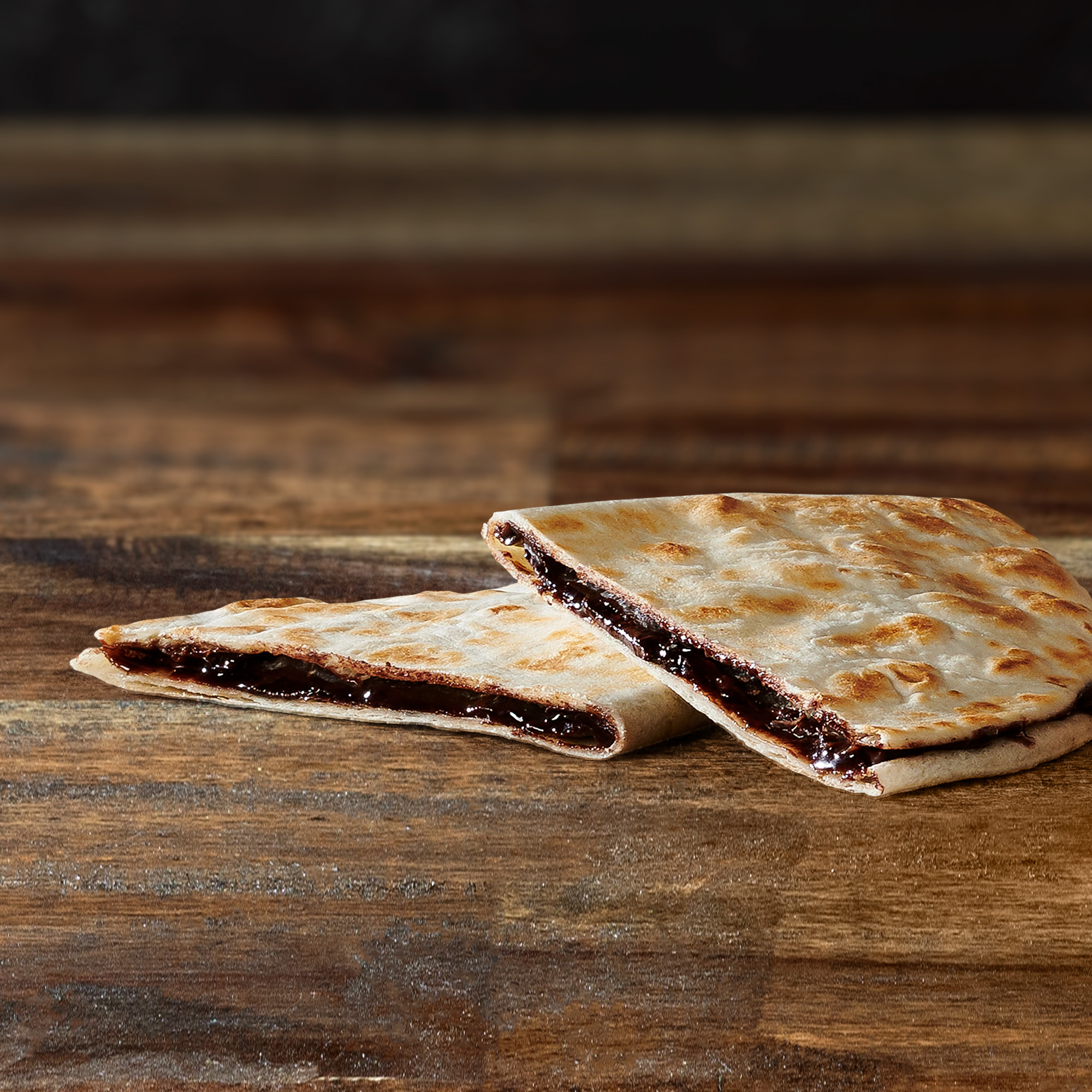 Chocodilla™  Gooey, melted milk chocolate oozing from inside a lightly grilled tortilla