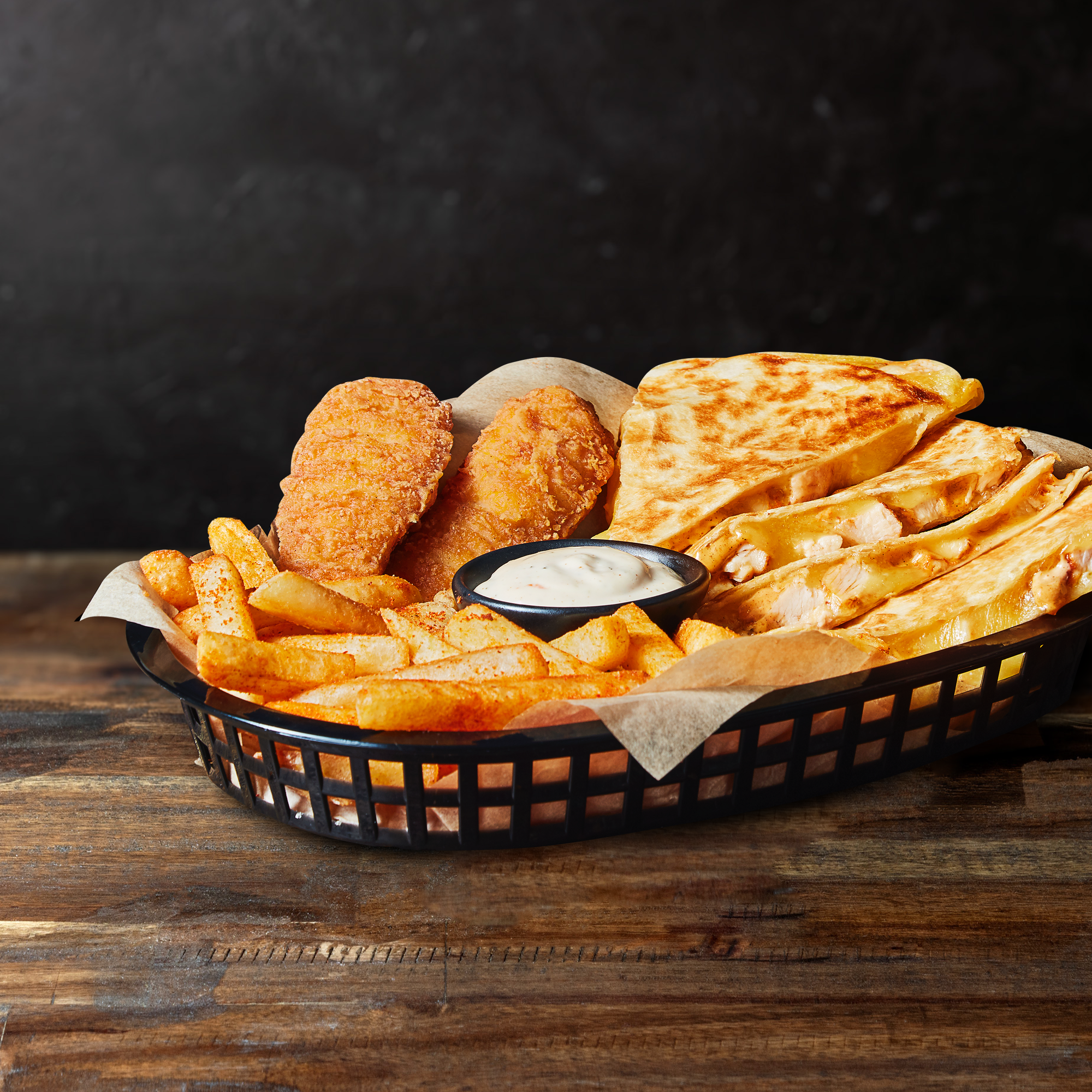 ASSORTED PLATTER  Looking for something to share? This is your go to, makes up of chicken quesadilla, crispy chicken strips, crunchy Mexican fries and creamy ranch sauce for dip.
