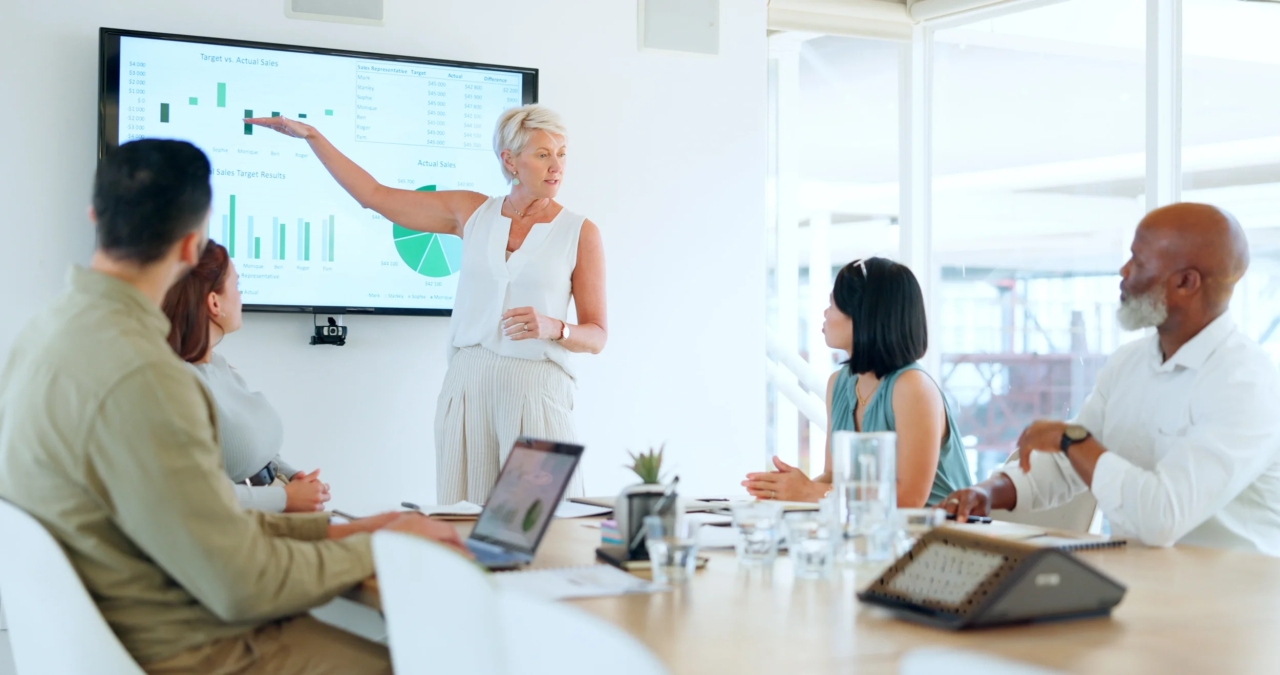 Presenter represents a Beauxhaus strategist walking a client team through performance reporting as part of an SEO for professional services engagement
