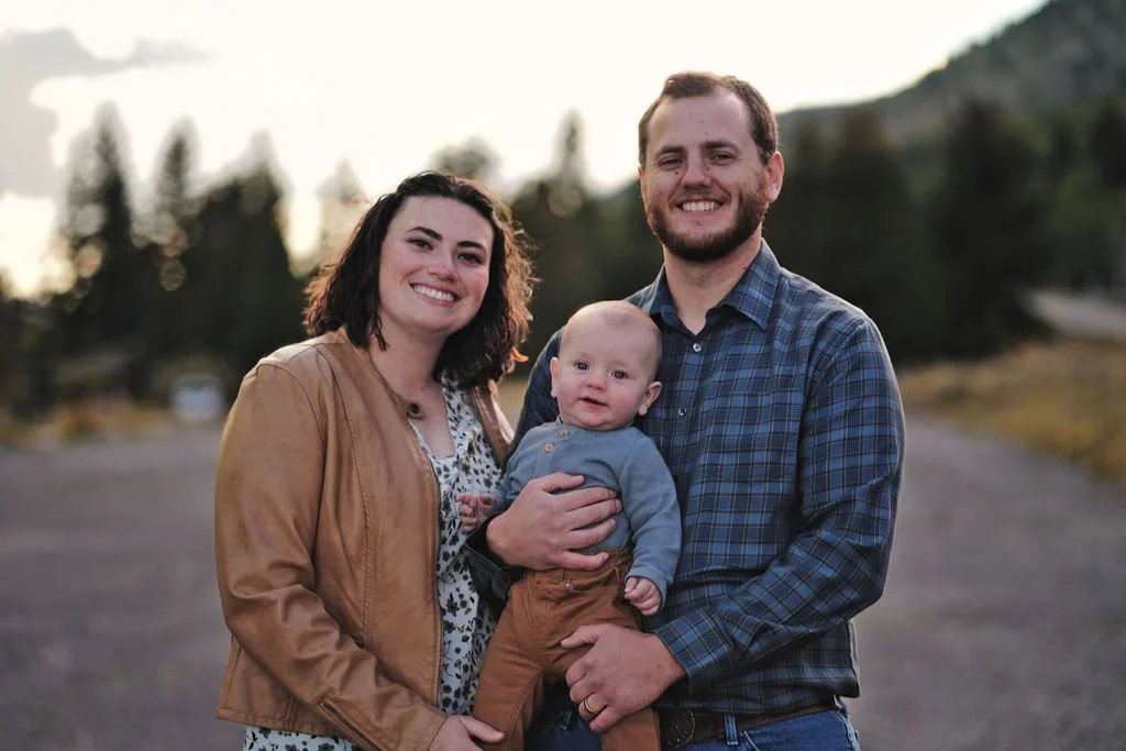 A family during their family photo session at Fish Lake in Sevier county near Richfield, Utah.