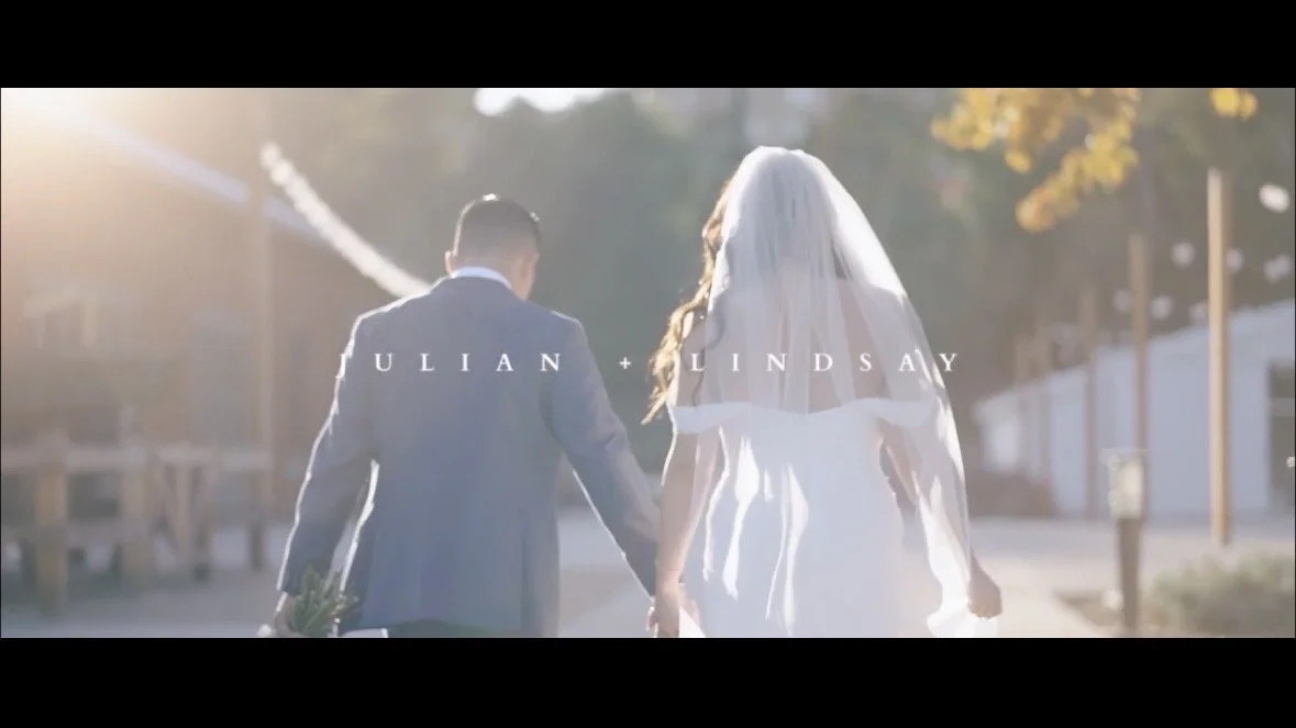 A bride and groom strolling along during golden hour at Aliso Viejo Ranch in Aliso Viejo, California..
