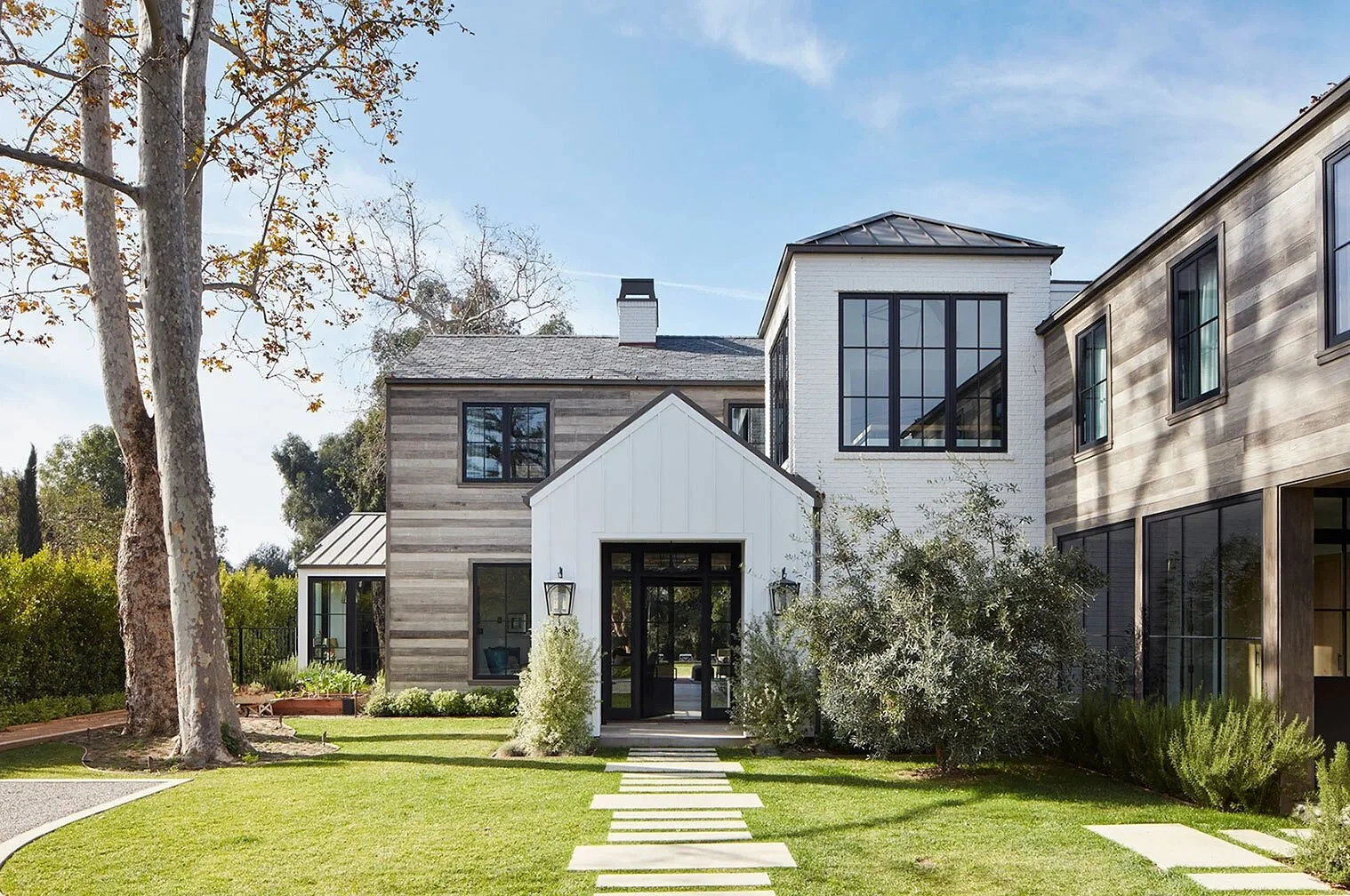 White-Brick-and-Reclaimed-Plankwood-House-Built-by-Healthy-Homes-Development.jpg