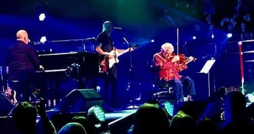 Itzhak Perlman performs with Billy Joel at Madison Square Garden