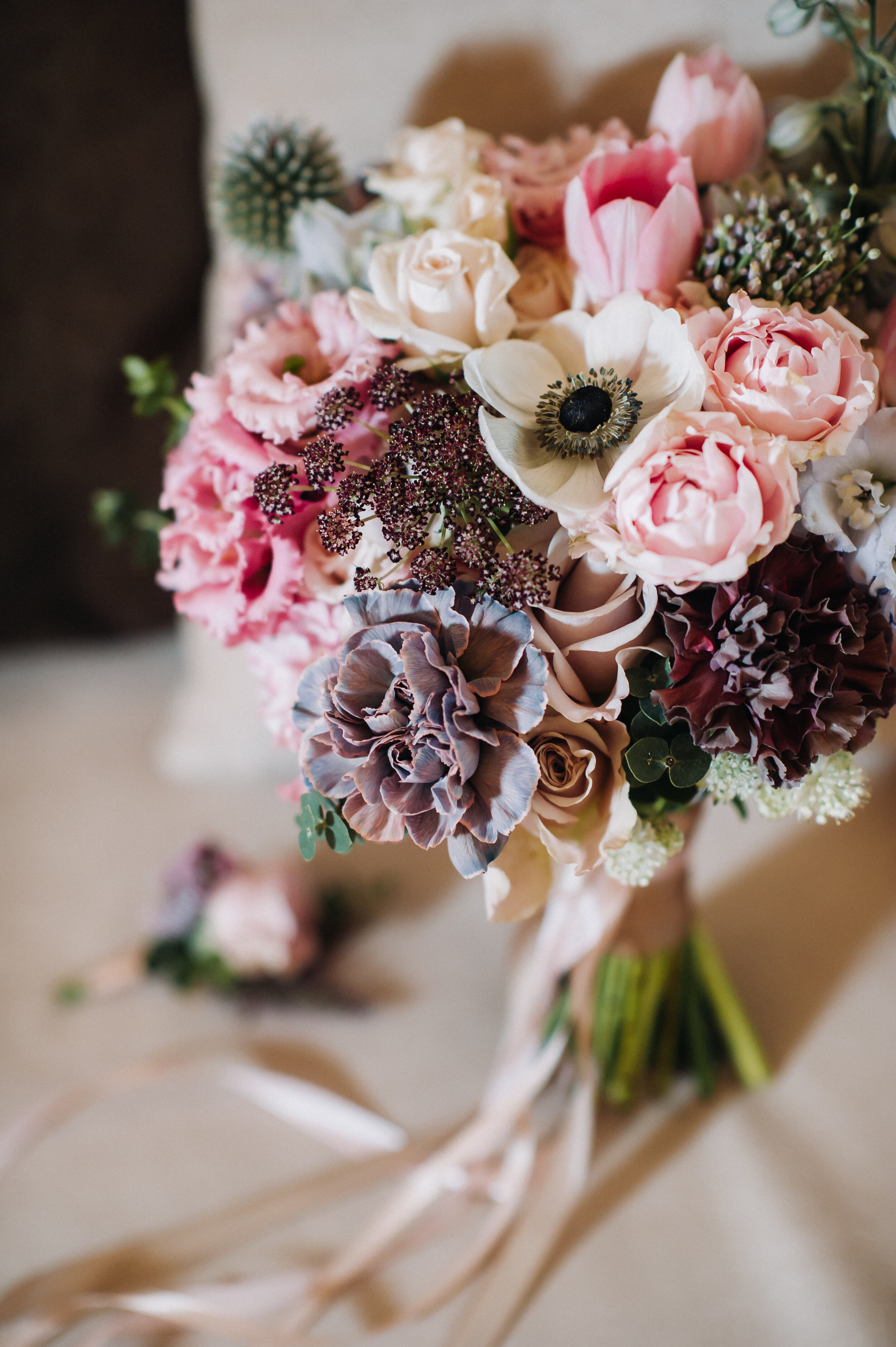 wedding-bouquet-with-roses-and-boutonniere-the-dec-MFW7BUF.JPG