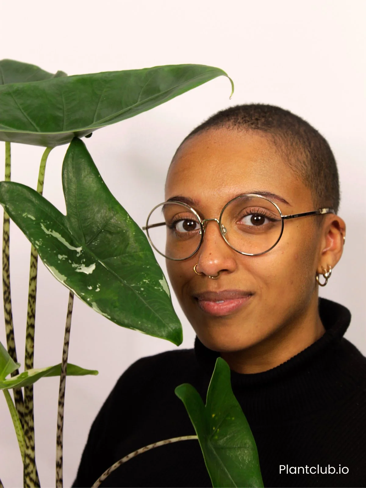  Angelique and an alocasia, her favorite plant. 