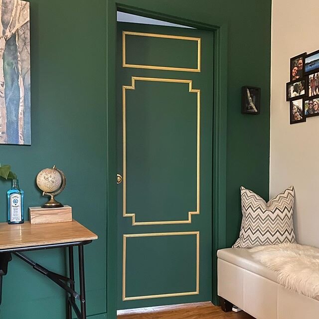Doors are an often overlooked design element. The client wanted to add an extra layer of luxury to brighten up the accent wall. Rich green blends into the wall allowing the gold trim to stand out. This small change made a huge difference in the feel 
