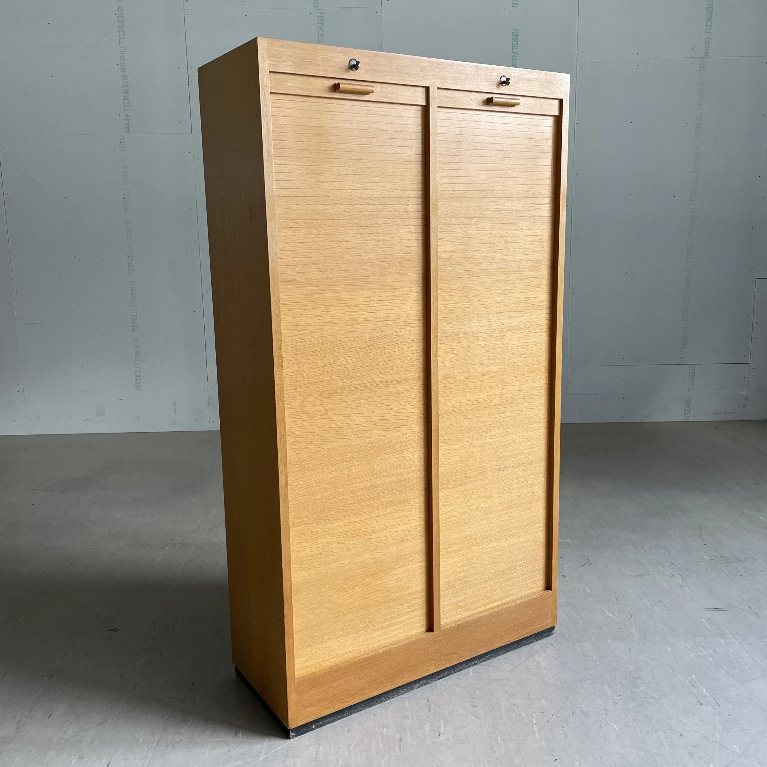 Roll fronted industrial storage cabinet