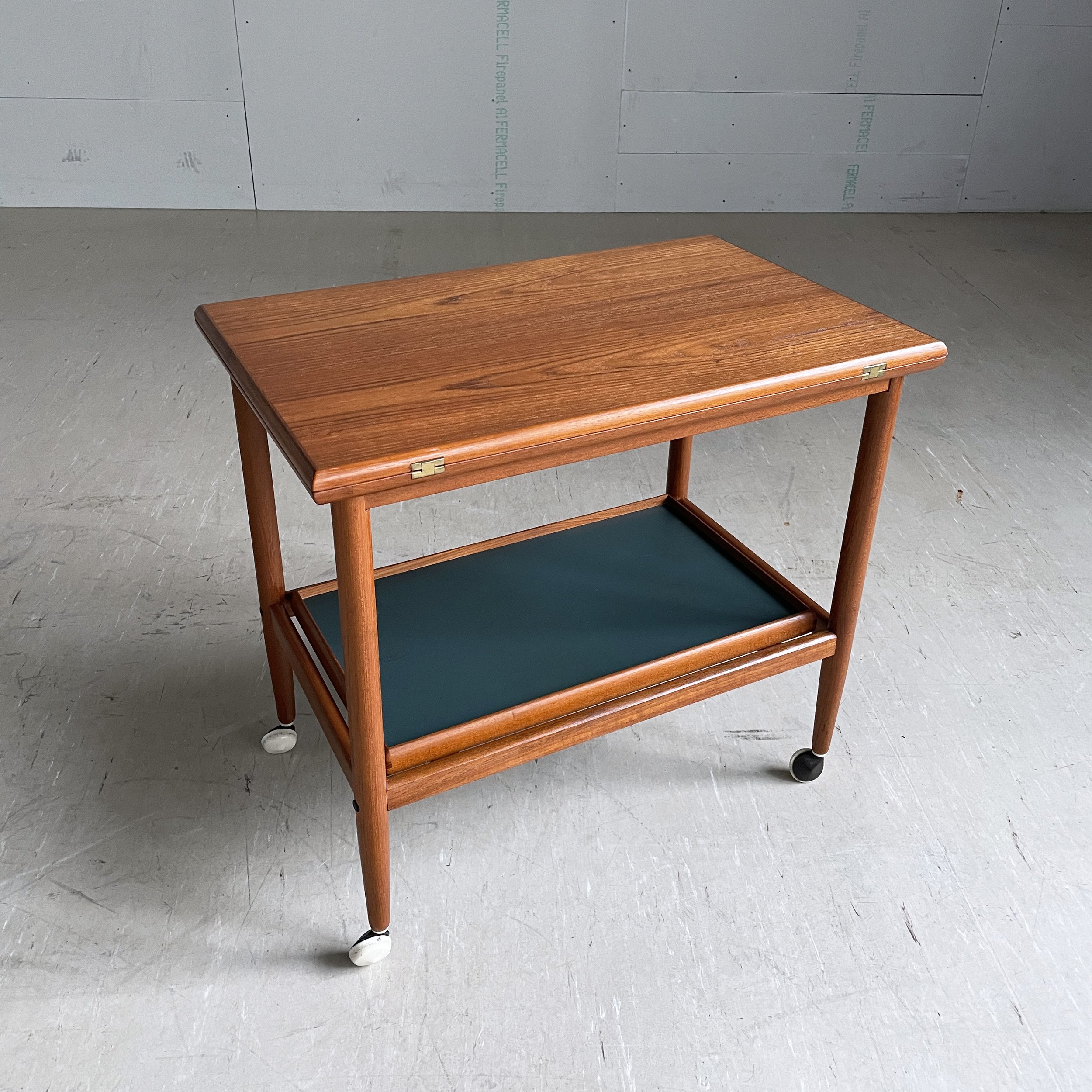 1960’s Grete Talk fold out teak service trolley/ table. Produced by ...
