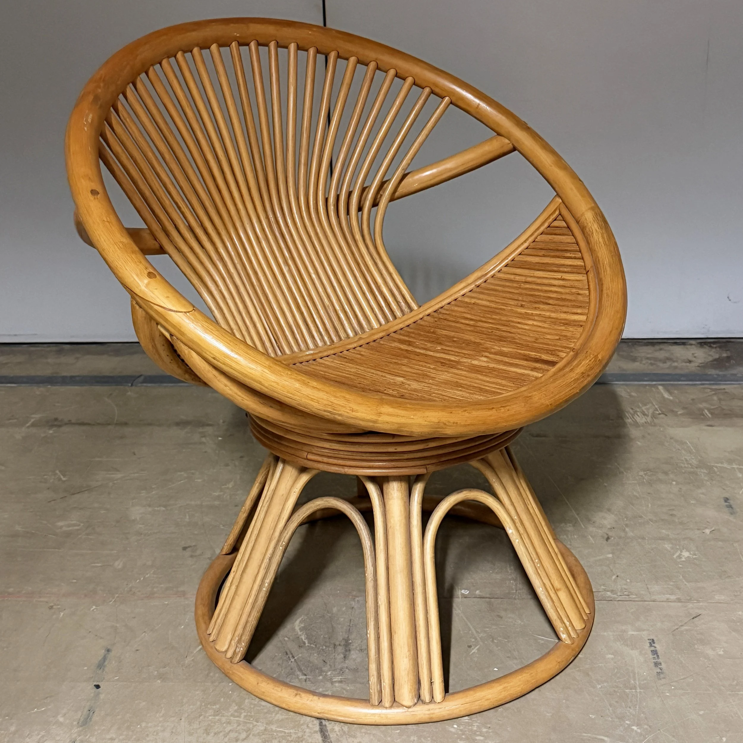 1970’s Swivelling Rattan Club Chair