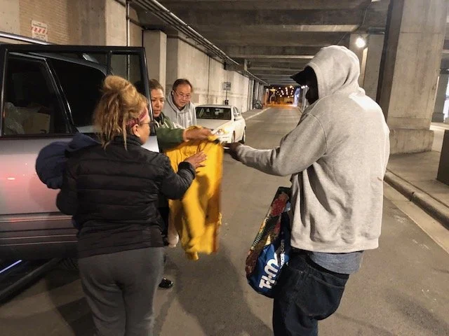 Maricela sizing-up a homeless man.