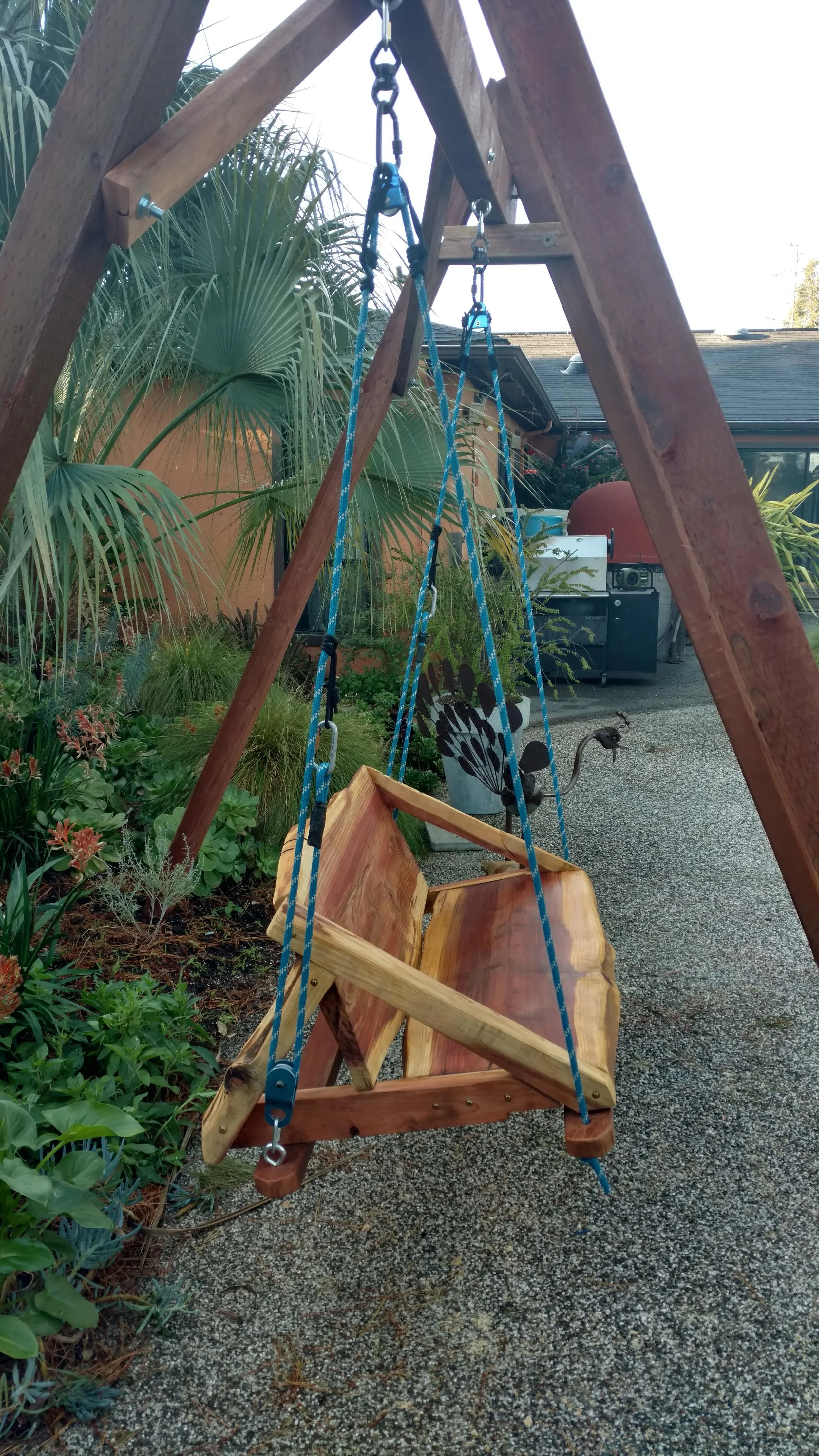 I used 12.5 mm low stretch rope, prusiks and pullies for the swing