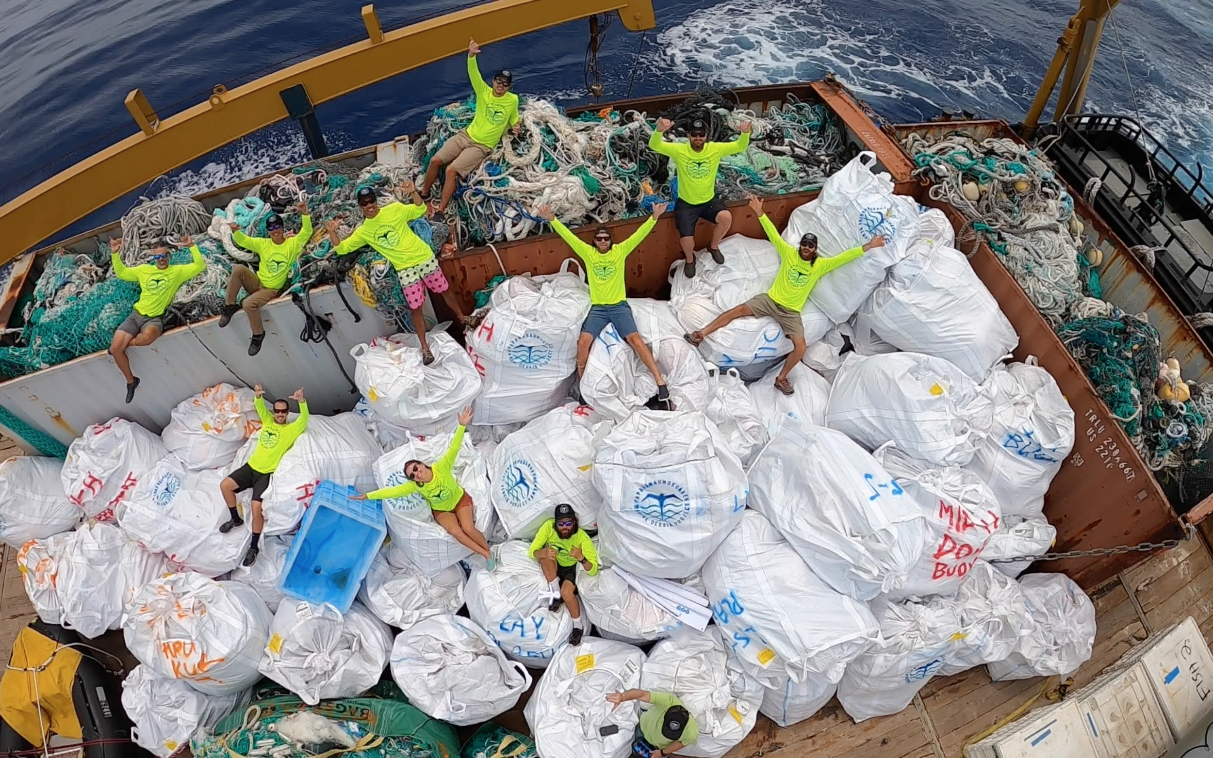 18. The Team with the Debris Pile at End of Mission Photo by PMDP.png