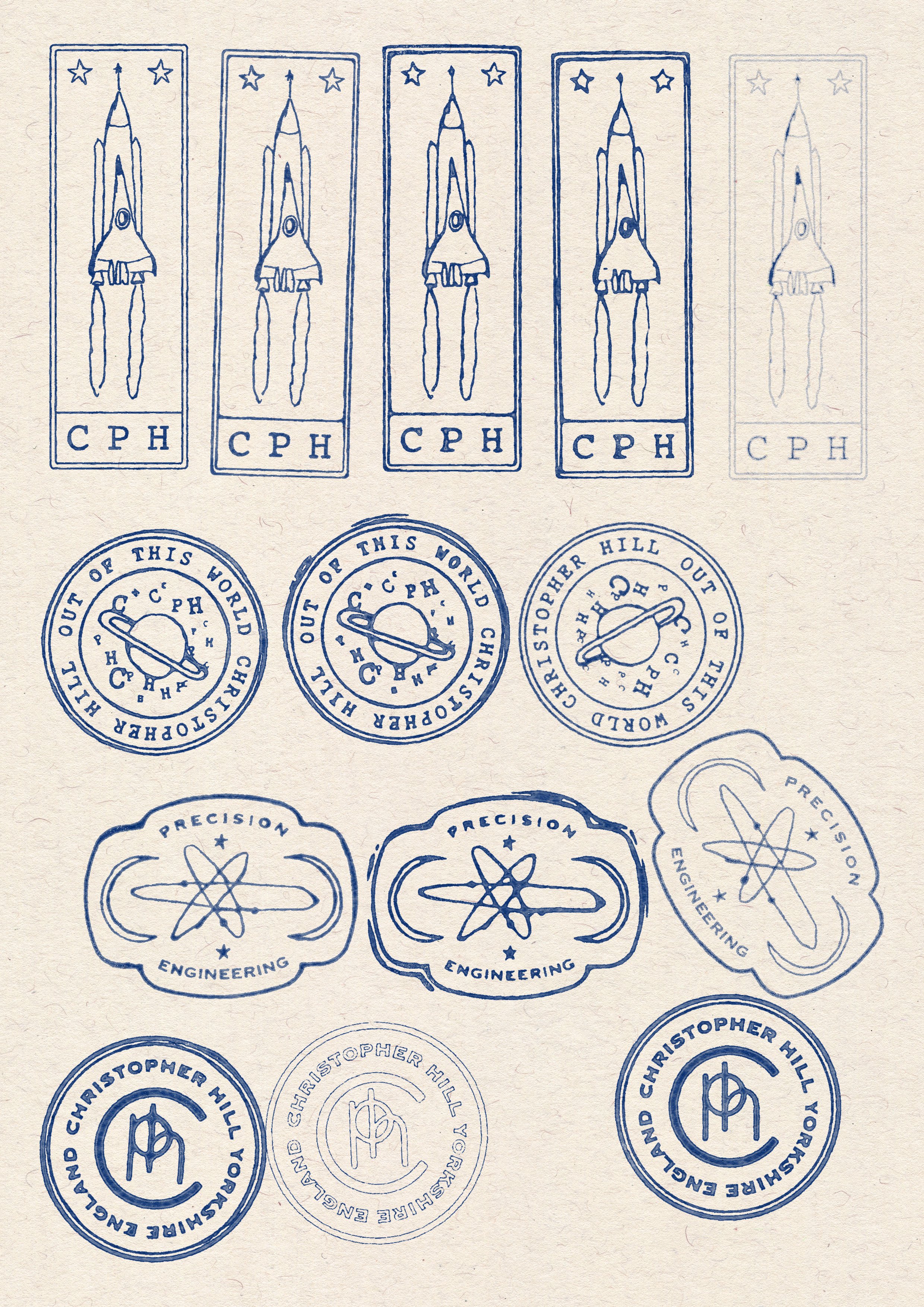 Illustrative stamps by artist, Isobel Hill for designer & maker, Christopher Hill. Illustrations feature a rocket ship and planets.