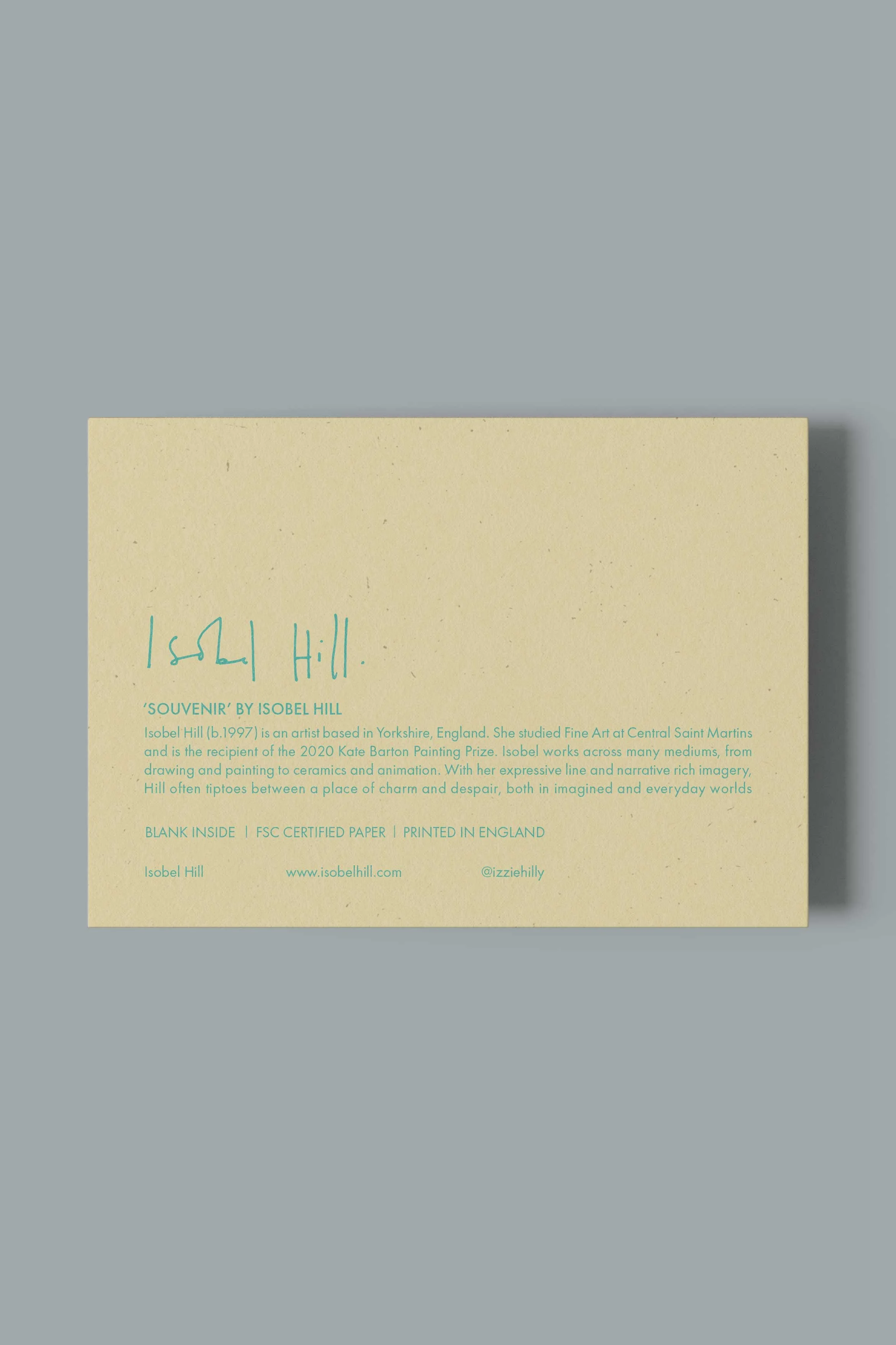 Reverse of Souvenir greetings card by artist, Isobel Hill. Hill's bio is listed below the title of the card.