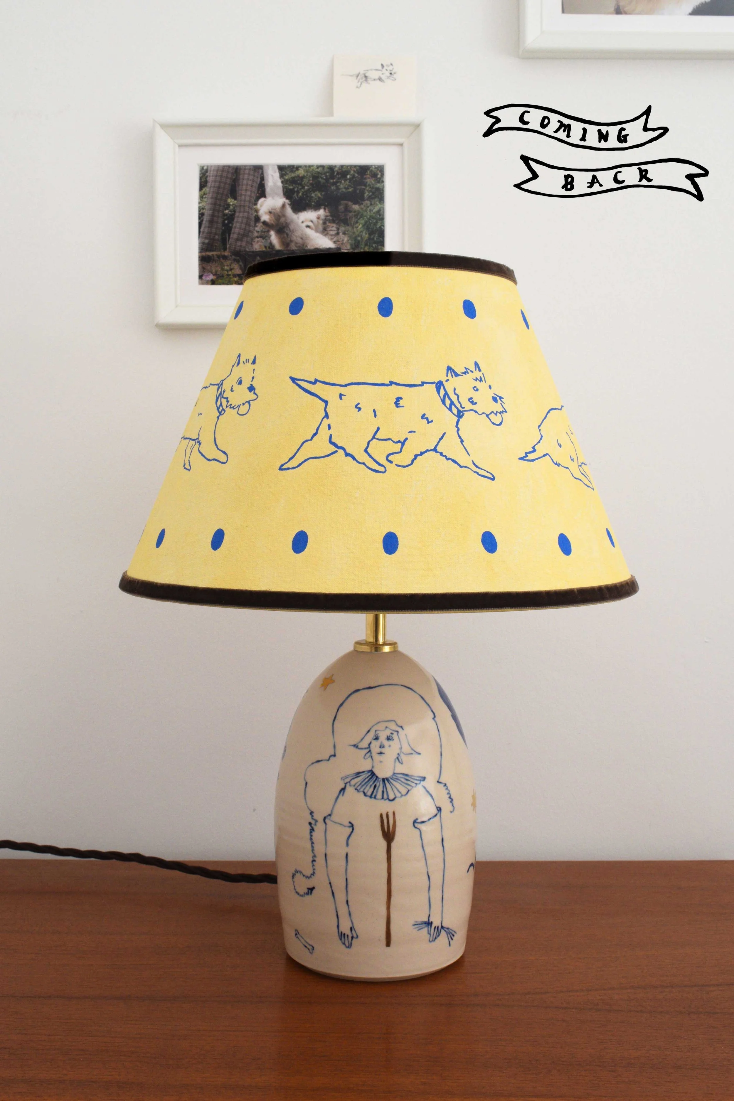 Handmade ceramic lamp base by artist, Isobel Hill, with painted Westie linen lampshade and illustrative figurative design.