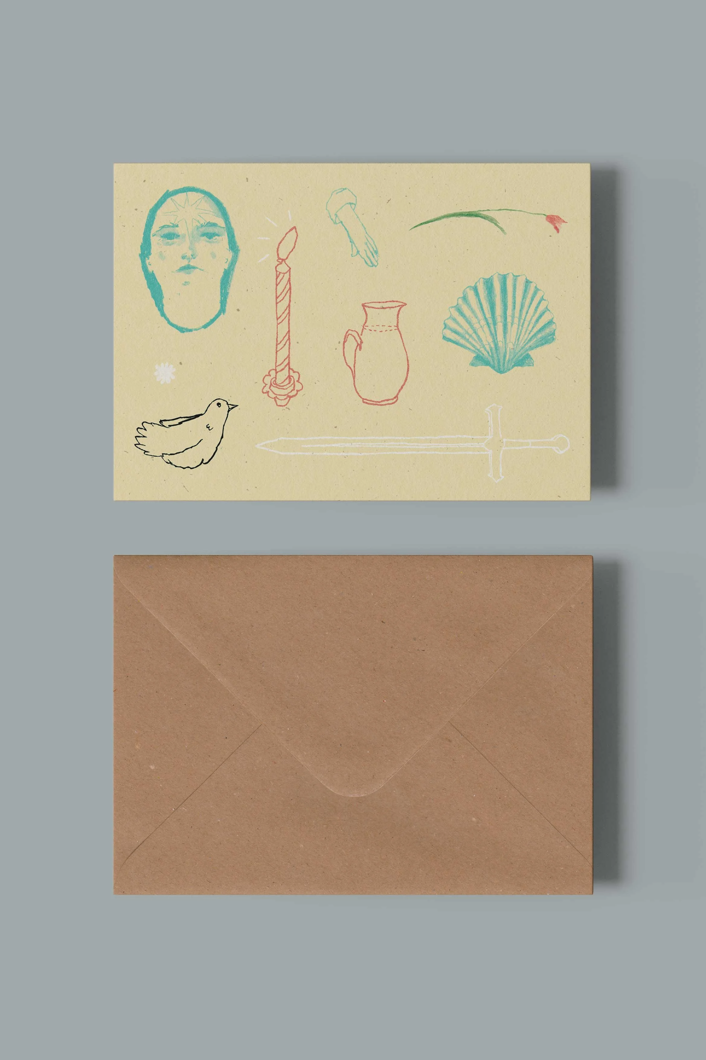 Greetings card and kraft envelope by artist, Isobel Hill. Souvenir Card features a blue face, sword, bird, candle, jug and tulip on a cream background. Colours are orange black, and cream