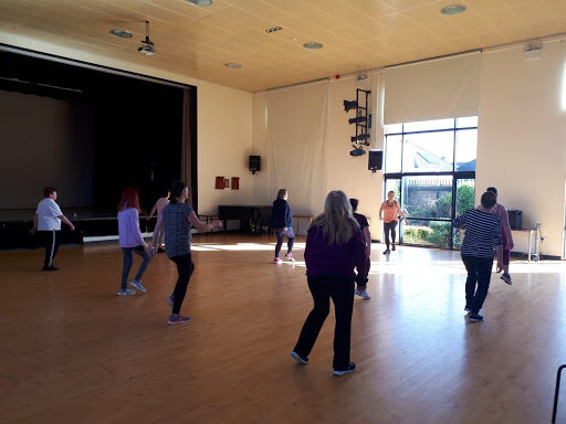 Parent Zumba classes in the school theatre.jpg