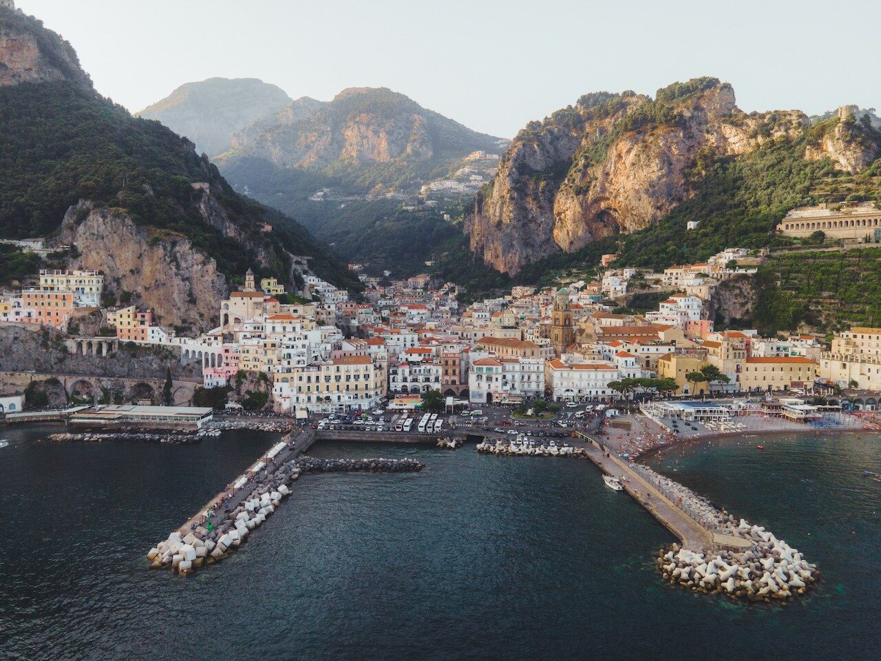 📍 Amalfi, Amalfi Coast, Italy

A Golden hour drone shot of Amalfi on the Amalfi Coast in Italy. This was taken during the incredibly hot spell in Italy in Summer 2023. Cooler evenings like this were a welcome respite from the day's heat. We were als