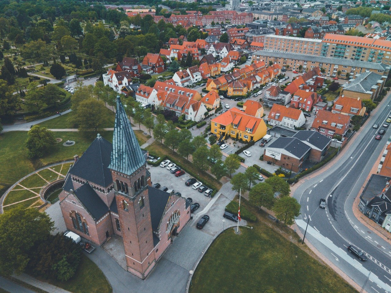 📍Odense, Denmark

Ansgar Kirke is situated right next to Munke Mose park in Odense, Denmark. It is relatively modern, with its construction being finished in 1902, making it the first church built in Odense since the Middle Ages. It is considered to