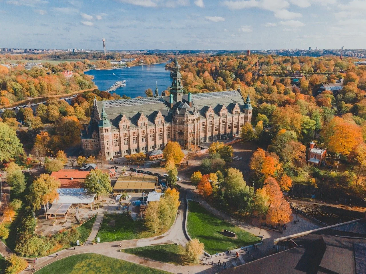 Autumn wraps the Nordic Museum in warm tones, where history and architecture meet Stockholm&rsquo;s most colorful season. From above, the scale and symmetry of this iconic building stand out against Djurg&aring;rden&rsquo;s glowing fall landscape. As