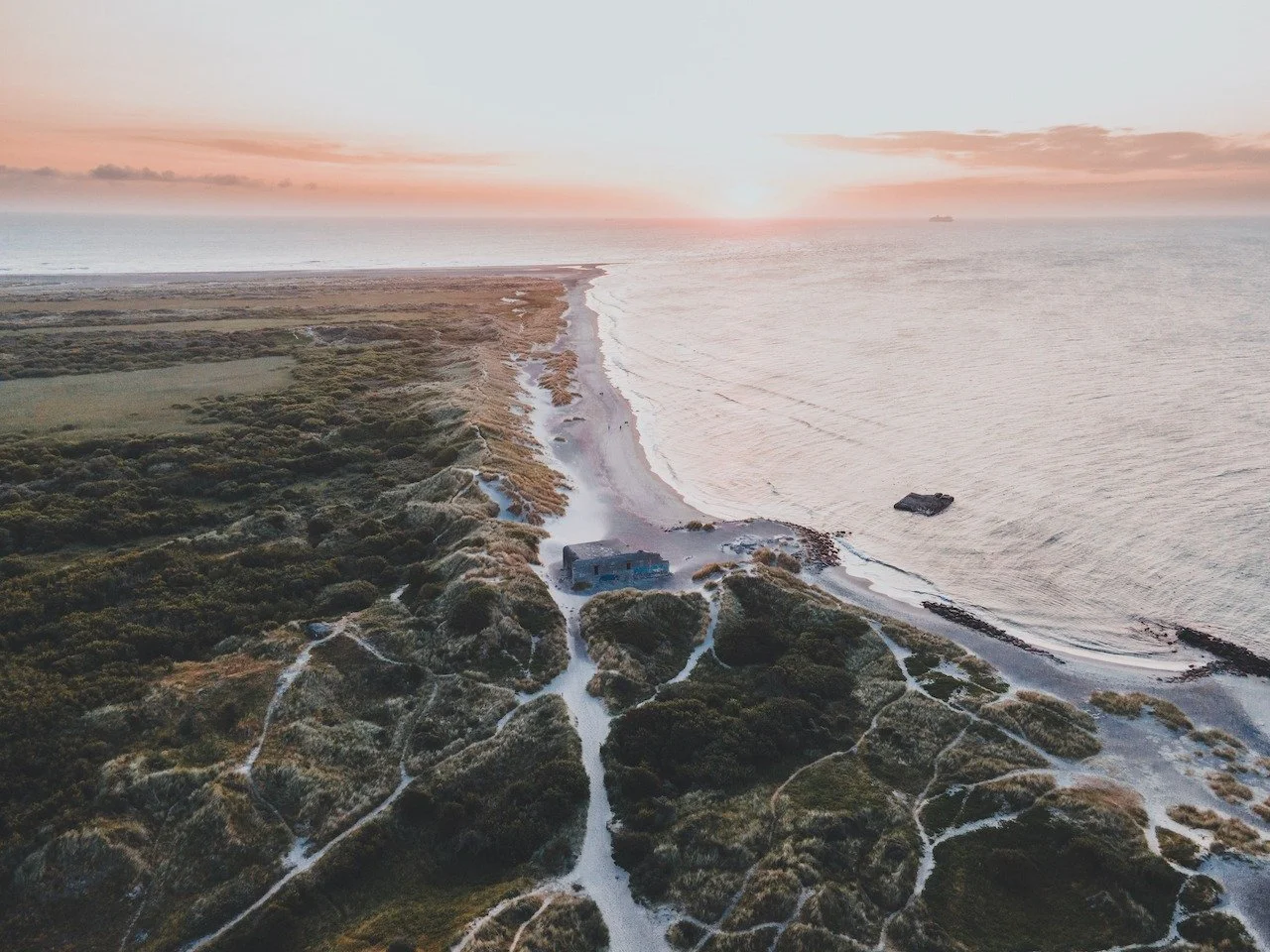At Denmark&rsquo;s northern tip, two seas meet but never mix. Grenen has long been shaped by shifting sands and strong currents, guiding sailors for centuries and influencing Denmark&rsquo;s maritime history. Raw, windswept, and endlessly dramatic, i