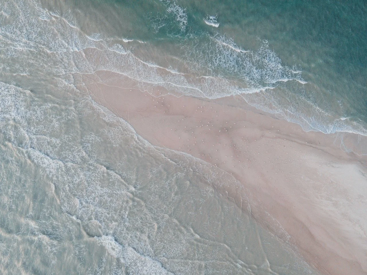 Where two seas meet but never truly blend. Grenen marks Denmark&rsquo;s northernmost point, shaped entirely by currents, sand, and constant motion. Seen from above, it feels less like a destination and more like a living edge of the continent.
.
.
.
