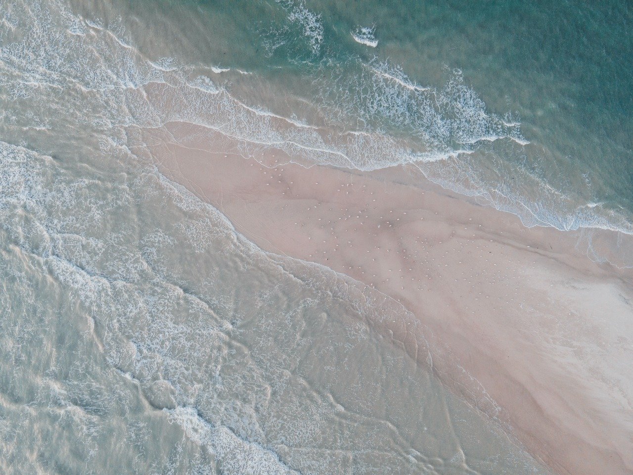 Where two seas meet but never truly blend. Grenen marks Denmark&rsquo;s northernmost point, shaped entirely by currents, sand, and constant motion. Seen from above, it feels less like a destination and more like a living edge of the continent.
.
.
.
