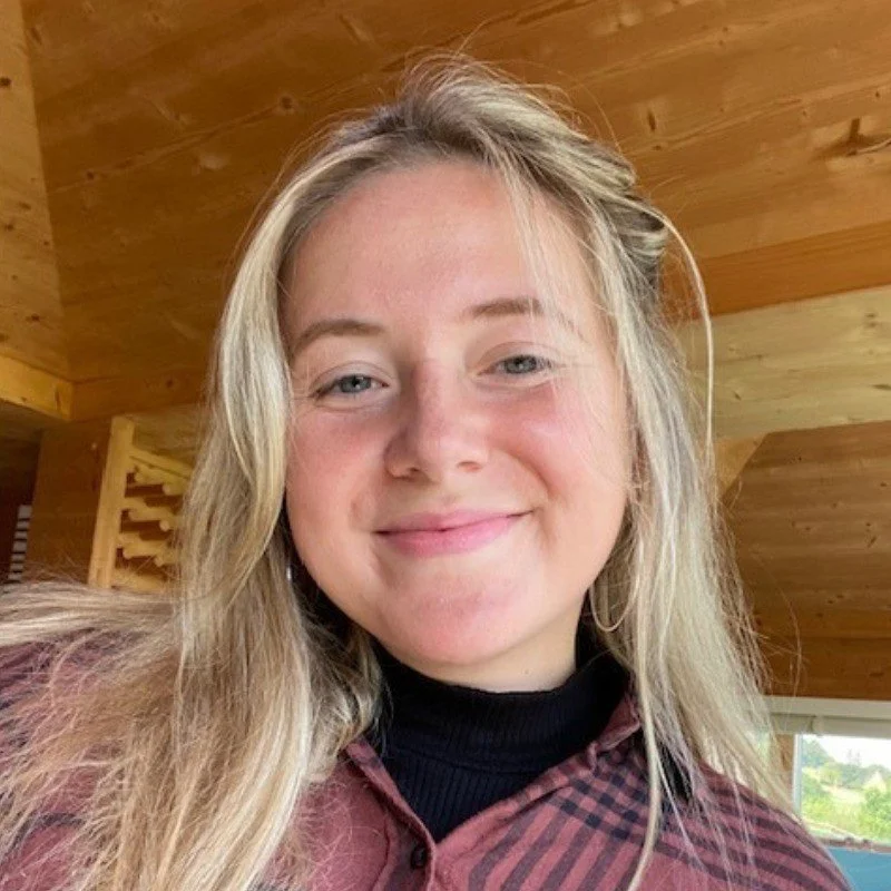 Jodie is a white woman with blonde hair. She is smiling to the camera.