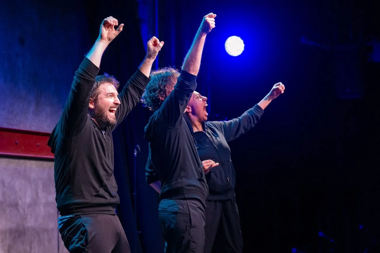 Fly, You Fools! cast celebrating on stage in a live Lord of the Rings parody by Recent Cutbacks