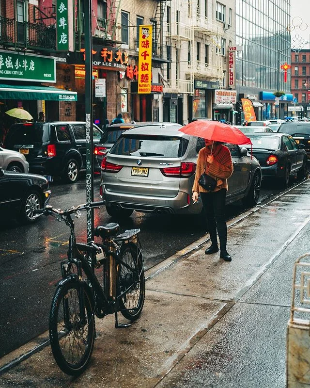 Waiting for dumplings in the rain.