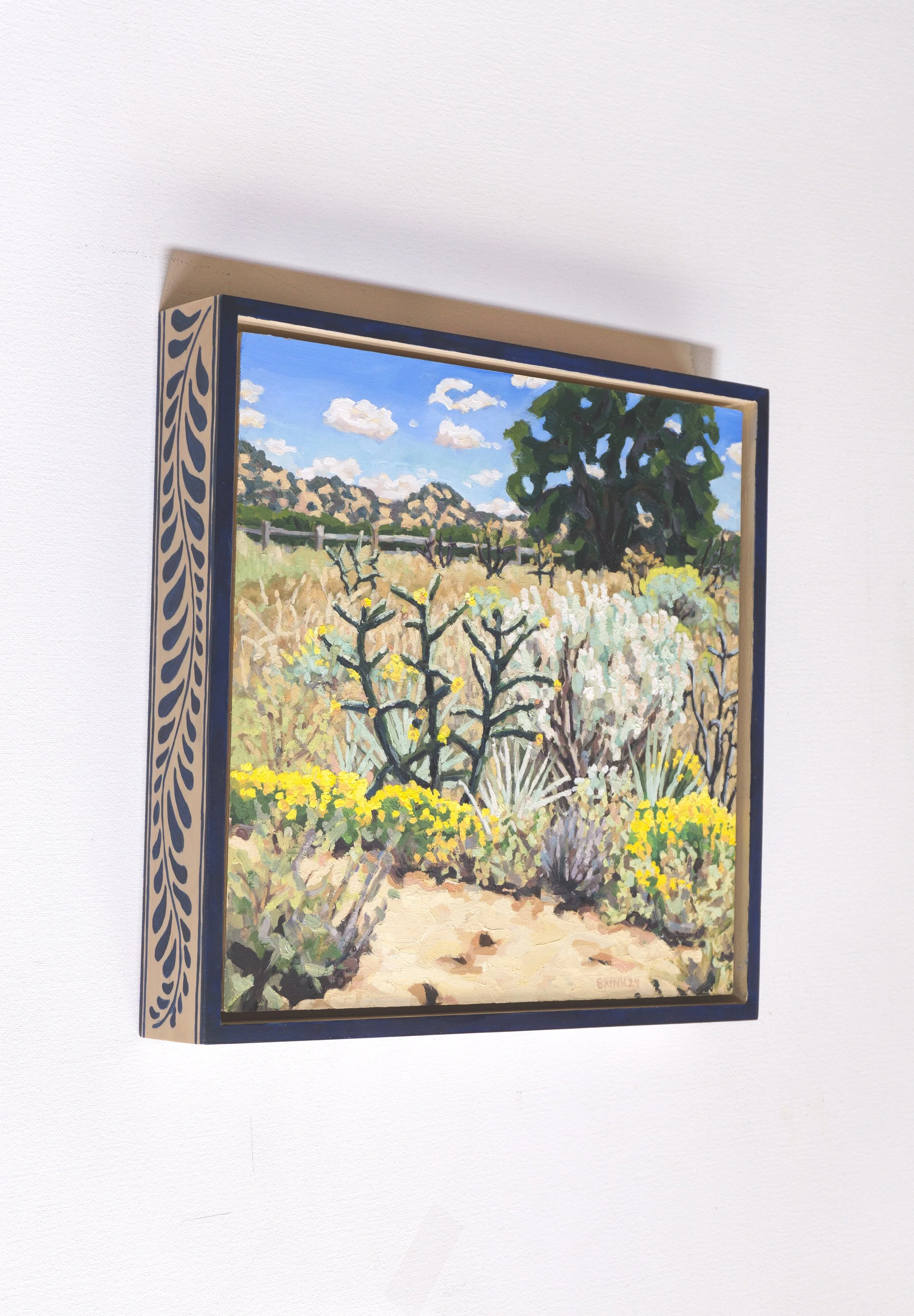 sunlit hills. oil/wood panel/hand painted wood frame. 11 x 11 x 2 in. 2024. $562.07