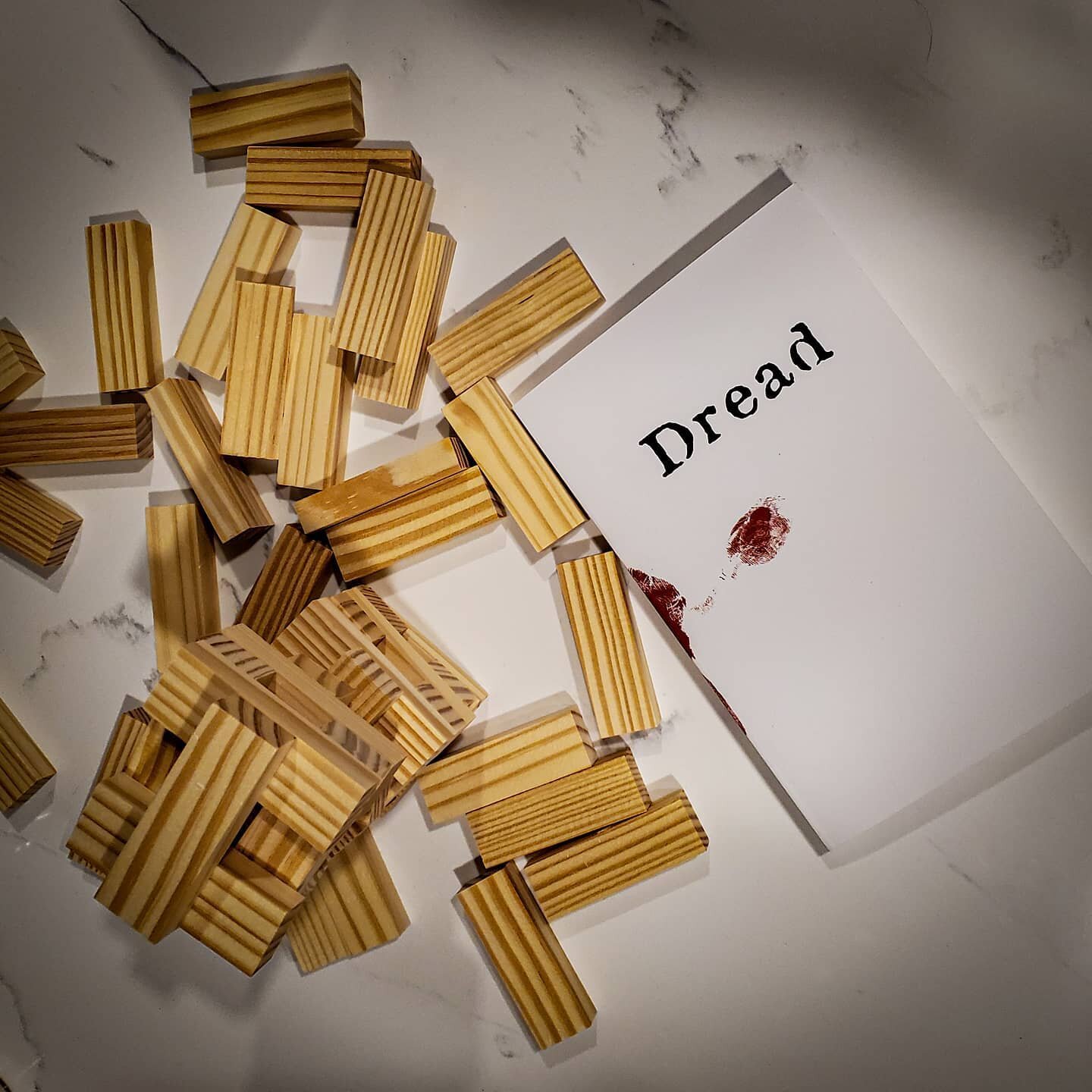 Tonight we played Dread for the first time. I loved it. It took me back to the old RPG days. I love a good horror game, especially when I control the narrative. Instead of dice you have a Jenga tower to define success and failure. Tower falls, you di