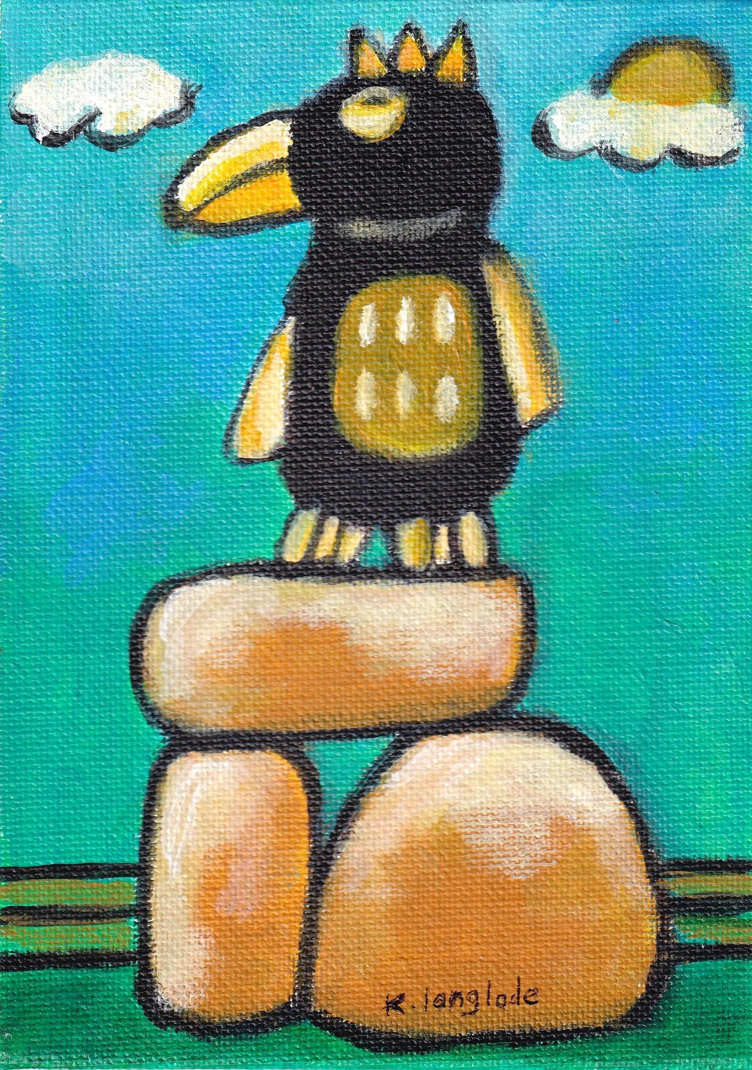 Black bird on boulders.jpg