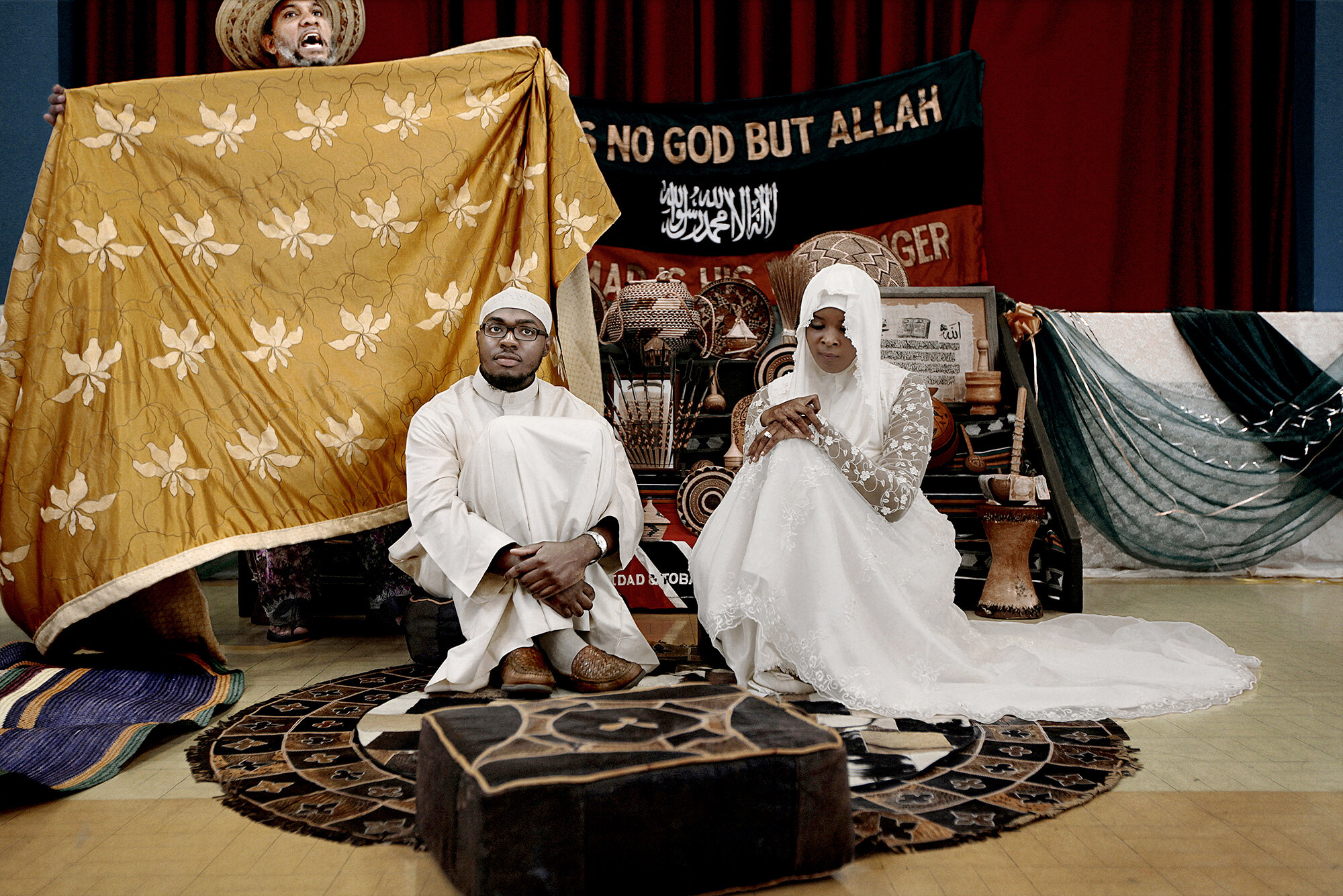   UK. Slough. 2011. KelekeAnyabwile [right], during her wedding. Keleke's family migrated to England from The Republic of Trinidad and Tobago. Her father, Shaykh Hasan [not seen here], is an Islamic leader of the local Afro-Caribbean Muslim Community
