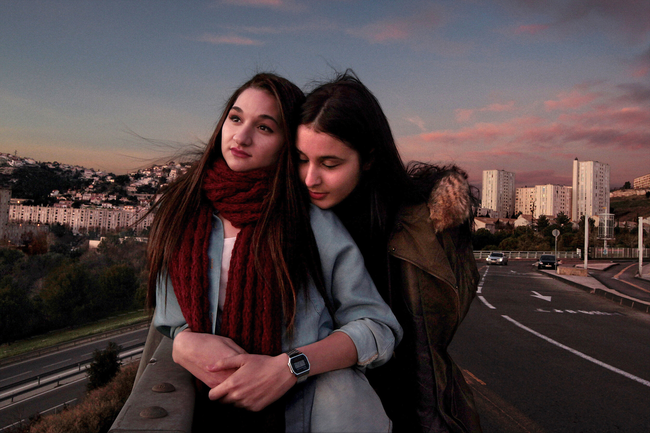   France. Marseille. 2013. Sofia [left] and Fatima had to wait for more than an hour before Sofia’s brother could finish work and come to pick them up from a shopping mall. The northern districts of Marseille, where a majority of the city’s Muslim po