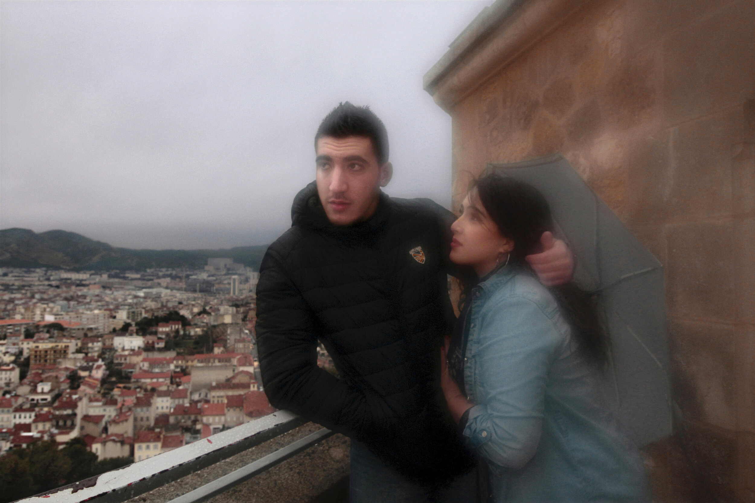   France. Marseille. 2013. Mehdy Bibi [left] meets his girlfriend at Notre-Dame de la Garde. They have known each other for five years and want to get married. But their families, for reasons undisclosed, have been opposing their marriage and have as