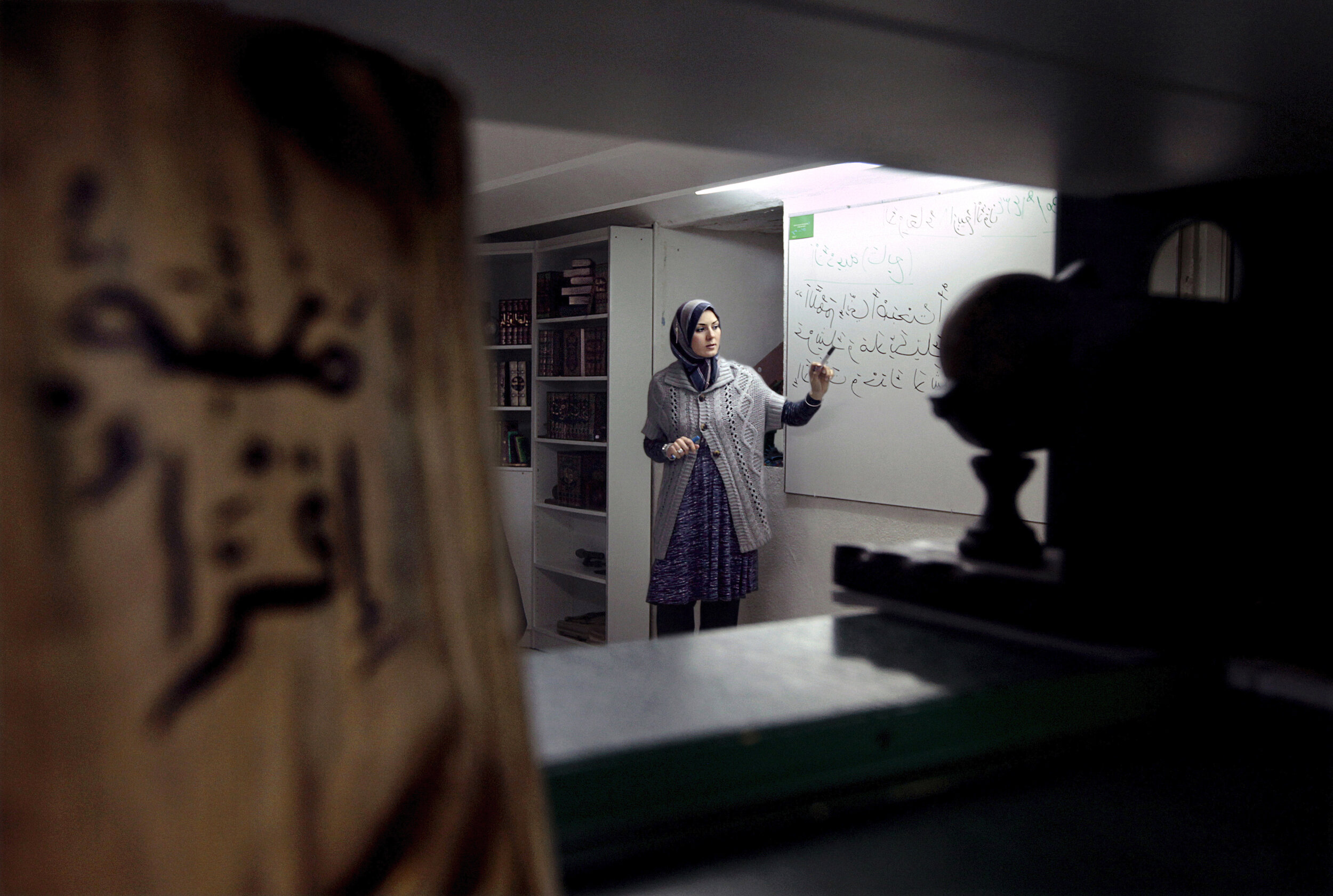   France. Marseille. 2013. WafaaAllal, 33, works as a part-time Arabic teacher conducting classes at the basement of an Islamic library. She is a single mother and has a 7-year old daughter. Wafaa has a Master’s degree in Translation [Arabic, Spanish