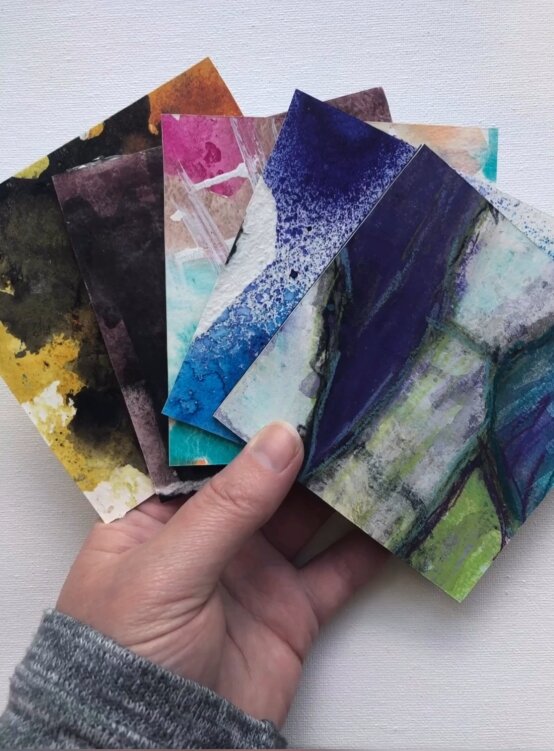 colorful paper scraps and encaustic collage layers with beeswax