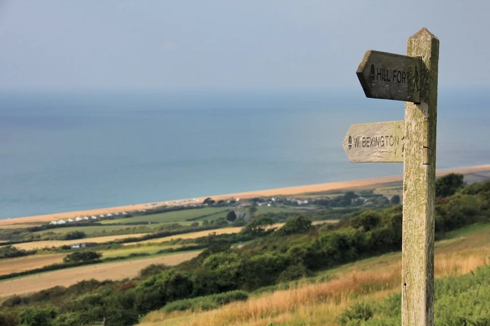 Footpath sign above West Bexington