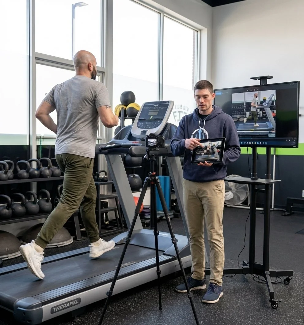 Runner receiving gait analysis at a physical therapy clinic in Rockville Centre