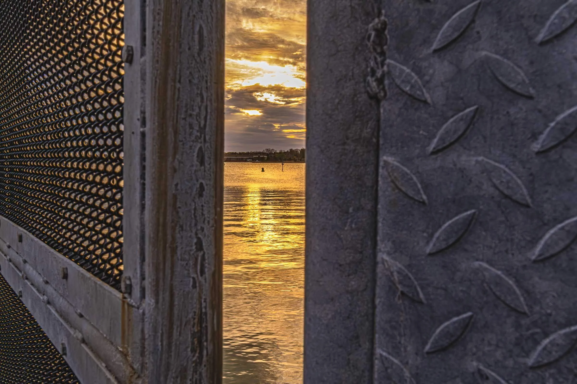 sunset through a gate at stony creek