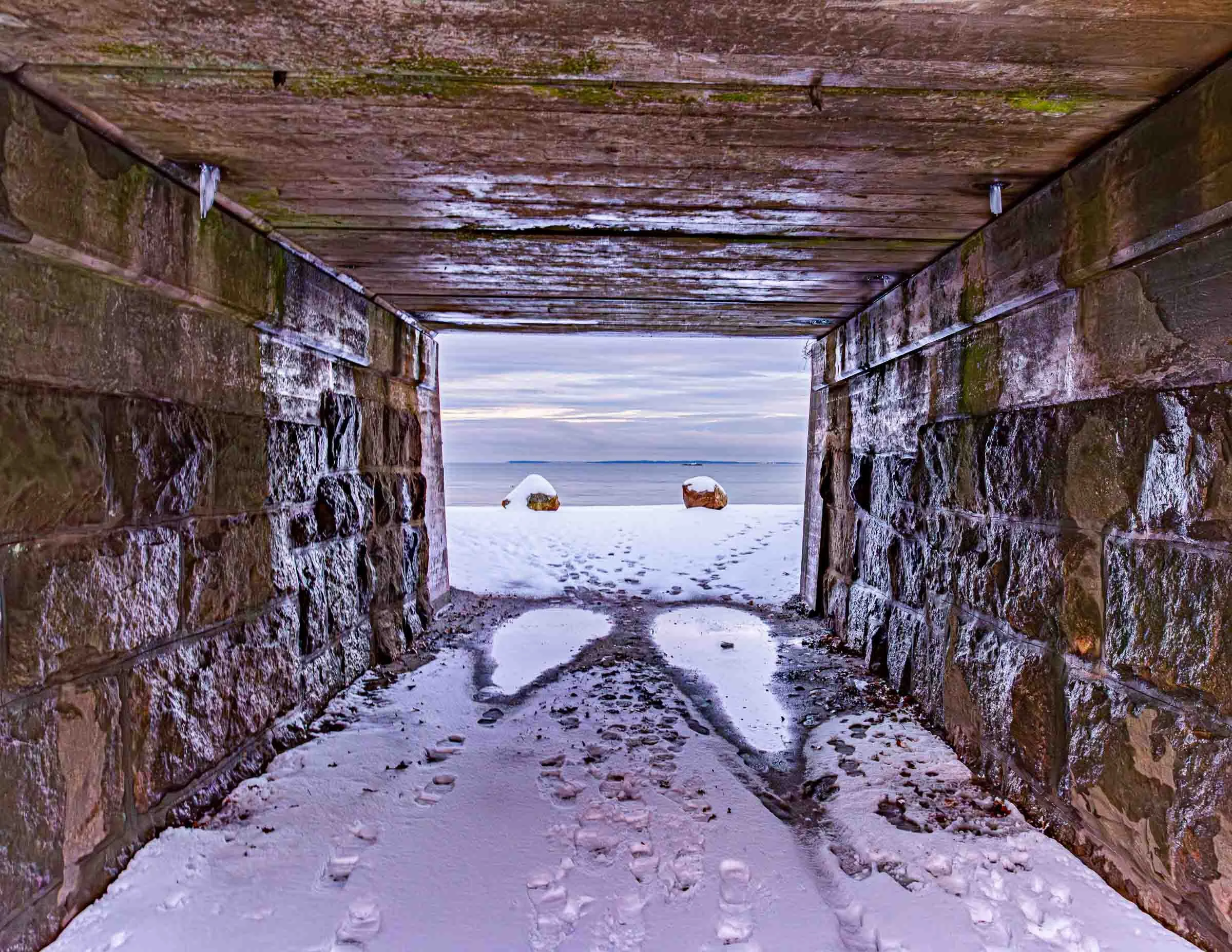 frozen path leading to the ocean at rocky neck