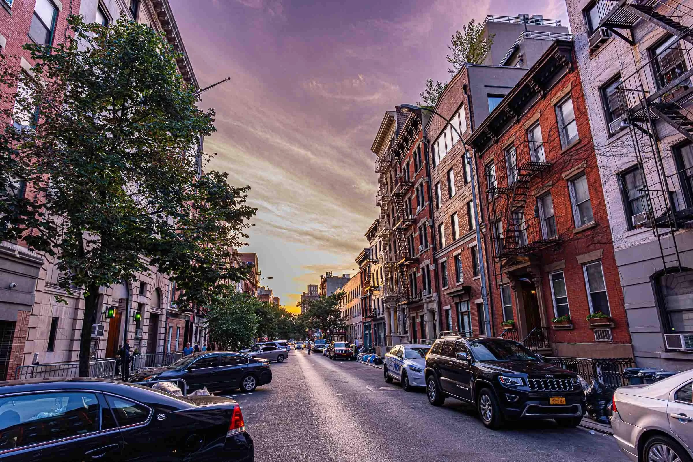 vibrant brownstone street during sunset