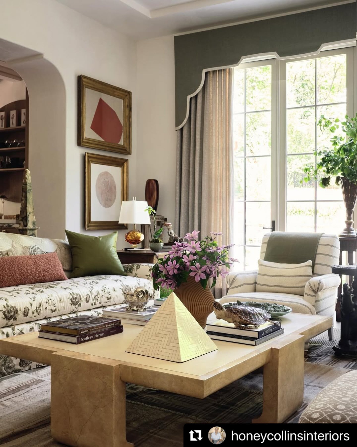 Run don’t walk to the @southeasternshowhouse in Atlanta to check out this gorgeous living room by event honorary chair @honeycollinsinteriors . Anchored by a stylish @ohenryhouse Dunmore sofa upholstered in our “Rose Nicholas” flor