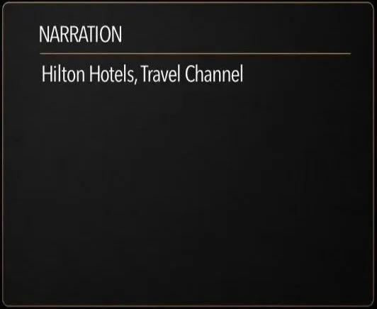 Screen showing a title slide with the text 'Narration, Hilton Hotels, Travel Channel' on a black background.